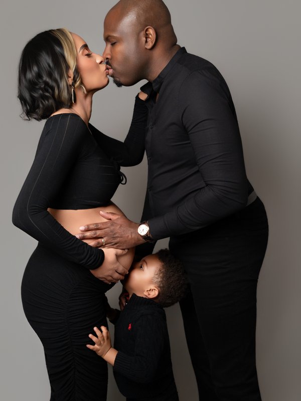 Kevin Socola Films maternity family photography DMV father son hugging bump